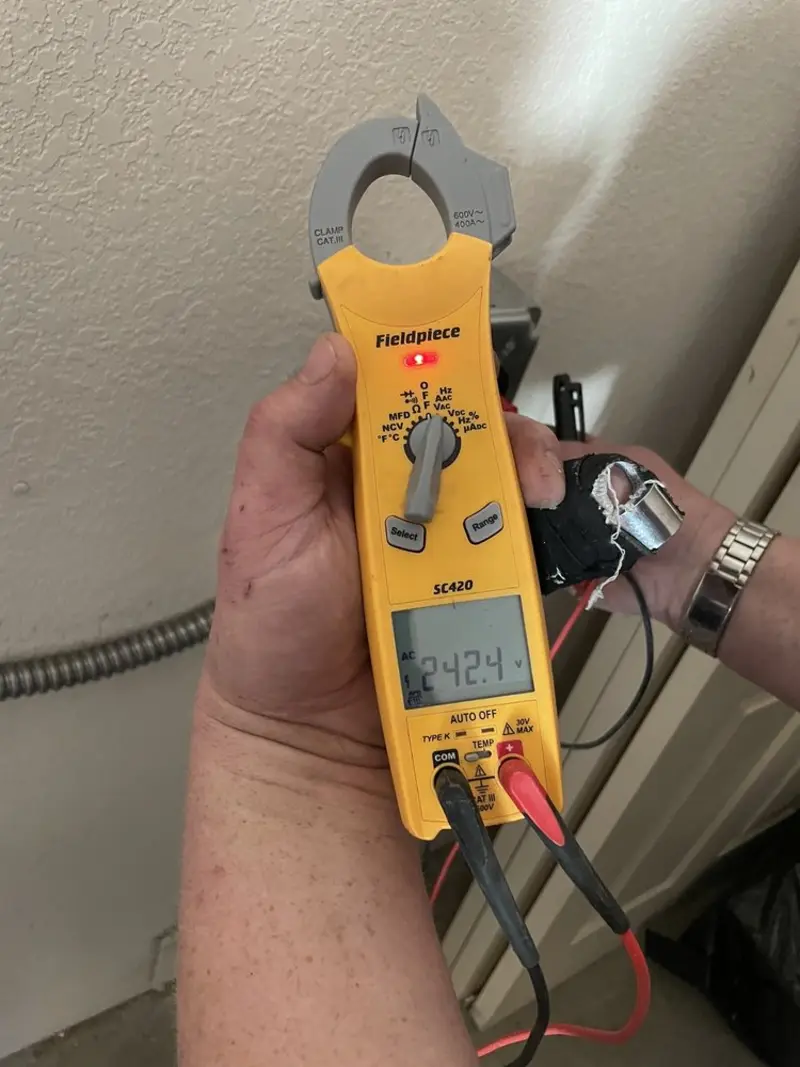 Voltage testing with clamp meter during Aluminum Wiring Replacement in East End